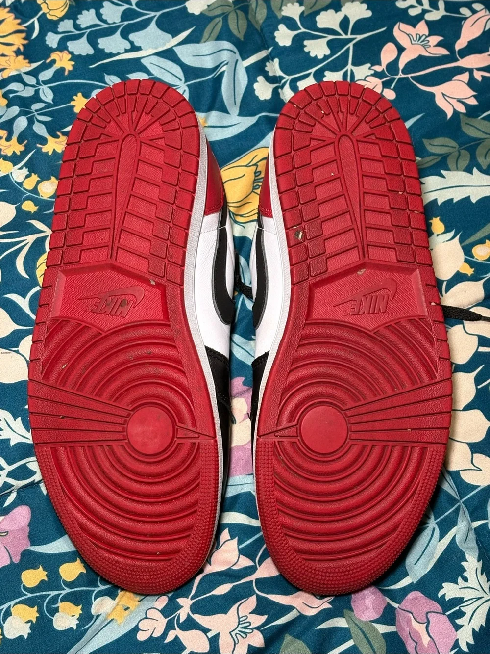 Jordan 1 Low Black and White Sneakers with Red Logo Accent